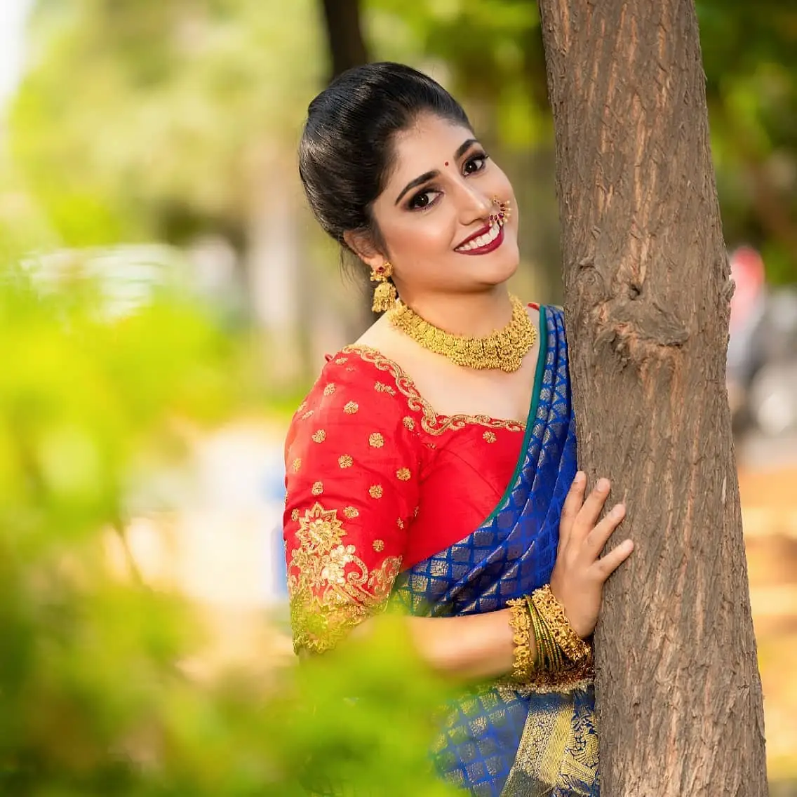 TELUGU GIRL PRANEEKAANVIKAA IN BLUE PATTU SAREE ORANGE BLOUSE